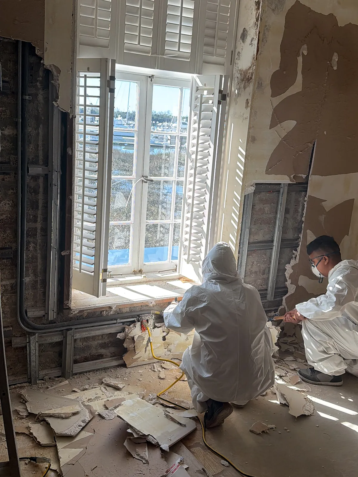 Antimicrobial treatment applied to structural surfaces after mold removal